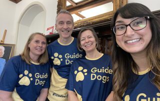 Staff running Reading half marathon for guide dogs